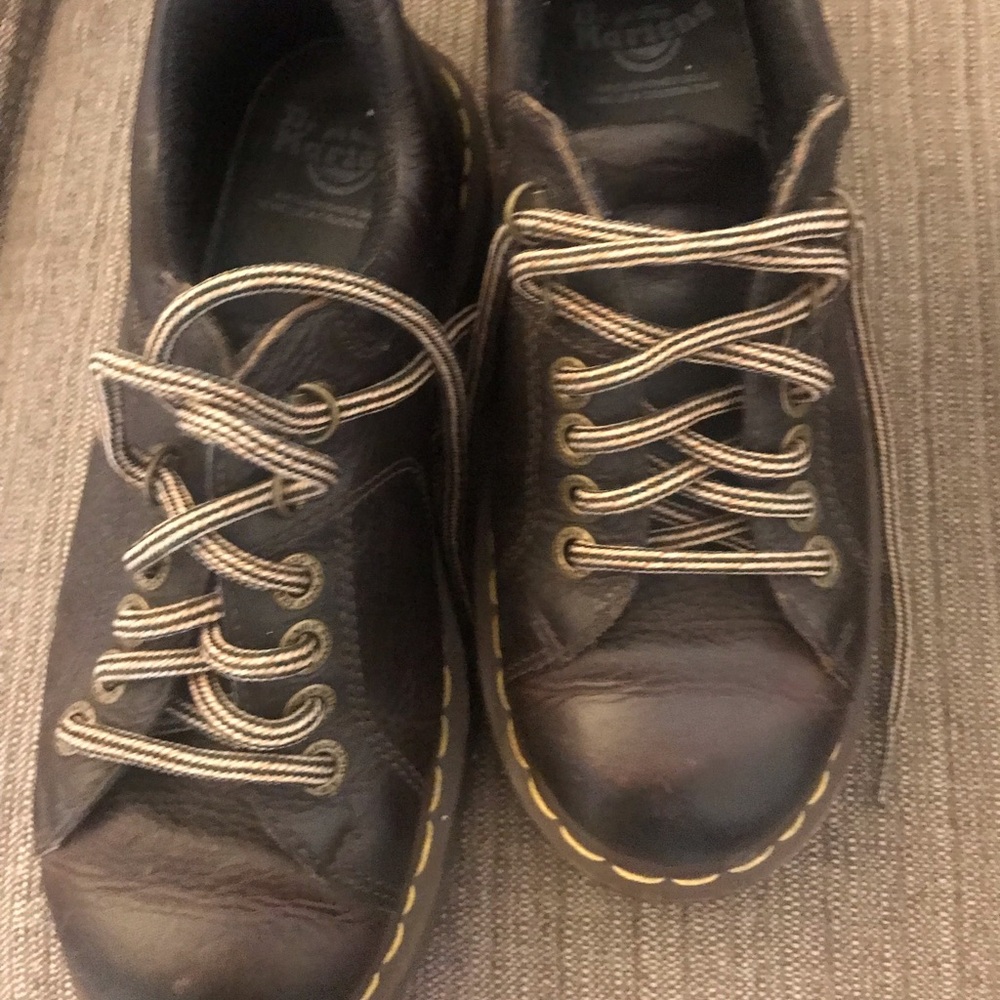 Women’s Dr. Martens dark brown low boot.